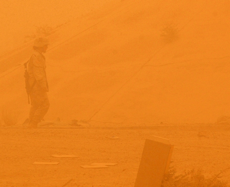 11. A United States Army Soldier (42nd
                            Infantry Division) Conducts a Post-Attack
                            Reconnaissance Sweep During a Big Sandstorm,
                            July 14, 2005, Balad Air Base, Al Jumhuriyah
                            al Iraqiyah - Republic of Iraq. Photo
                            Credit: Staff Sgt. (SSgt) Chad Chisholm,
                            United States Air Force (USAF,
                            http://www.af.mil); Army Images
                            (http://www4.army.mil/armyimages, U.S. Army
                            Image ID: CSA-2005-07-22-091514), USAF Image
                            ID: 050714-F-9209C-002; Photo Courtesy of
                            United States Army (U.S. Army,
                            http://www.army.mil), United States
                            Department of Defense (DoD,
                            http://www.DefenseLink.mil or
                            http://www.dod.gov), Government of the
                            United States of America (USA).